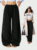Pantalones anchos con cordón